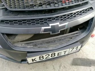 Как снять решетку радиатора на шевроле круз?